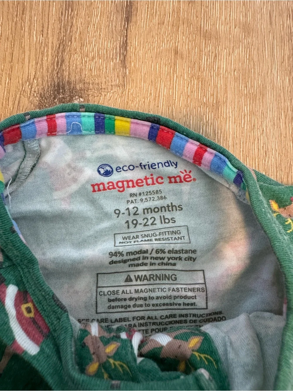 Magnetic Me baby footie in the 